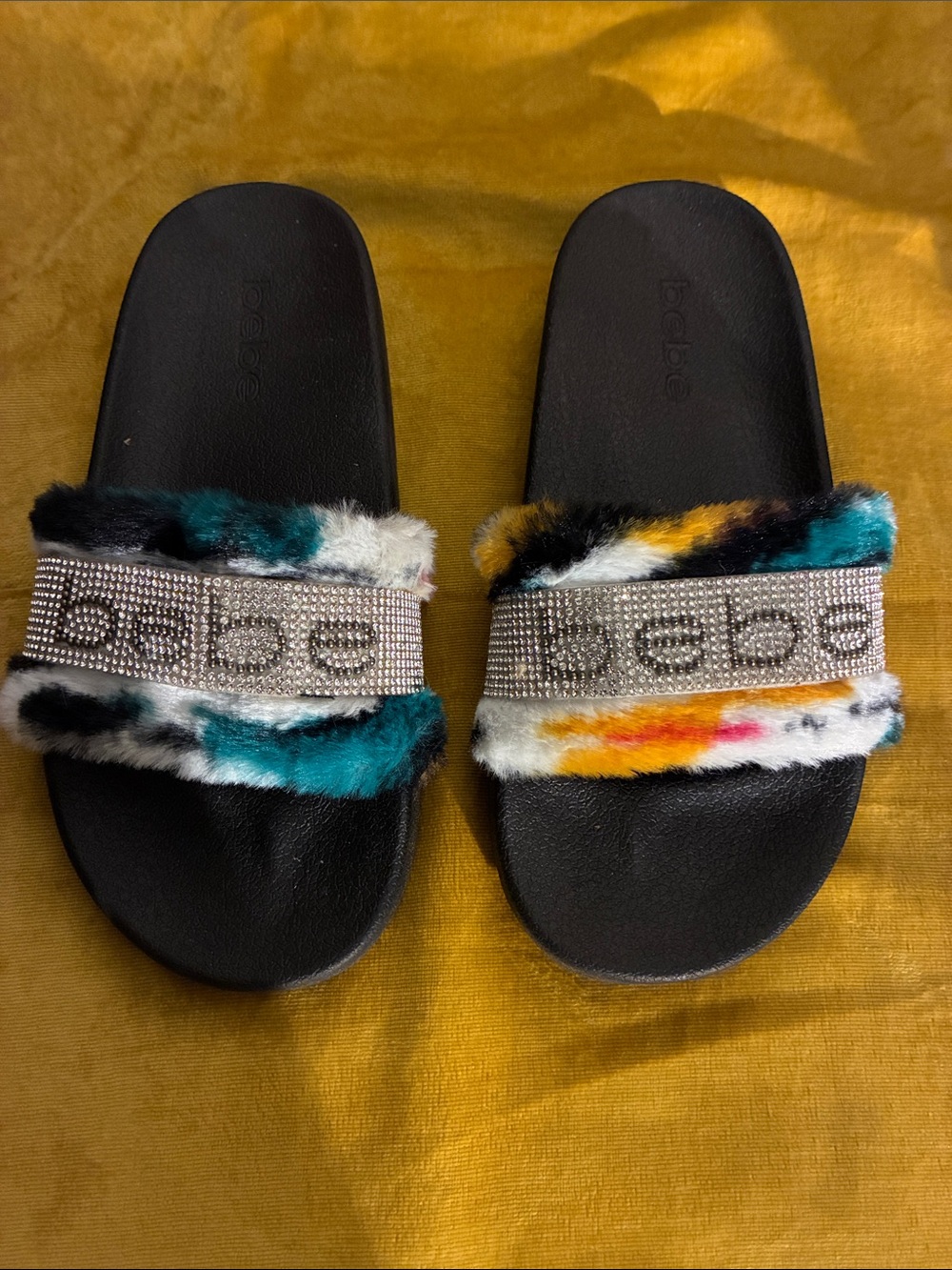 bebe Black Slide Sandals with Multicolor Faux Fur and Crystal Logo Strap